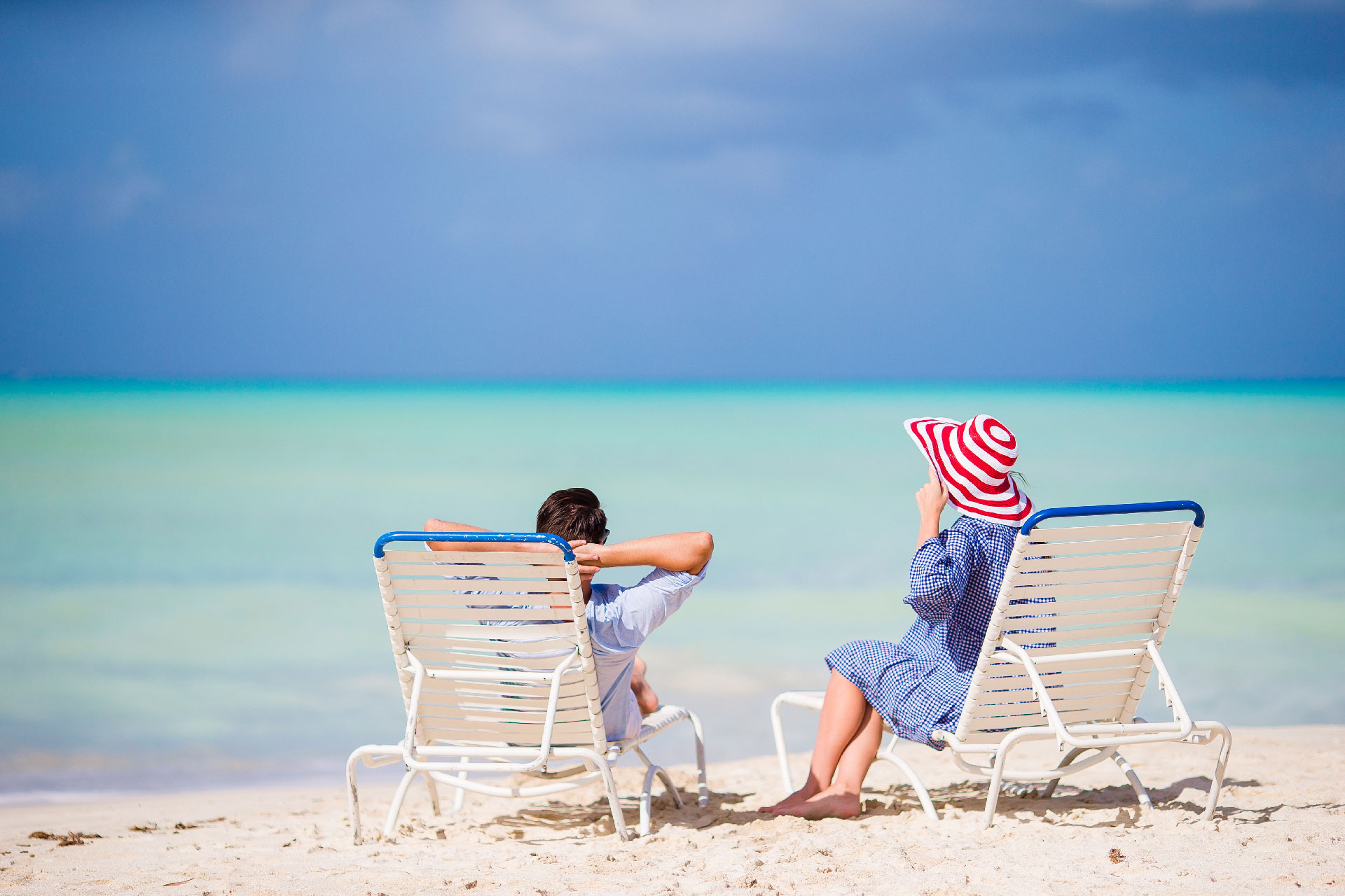young-family-on-white-beach-during-summer-vacation-2023-11-27-05-29-27-utc