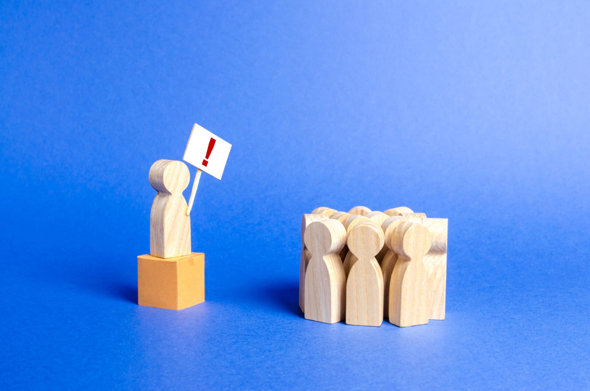 a-person-with-a-poster-exclamation-mark